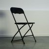 Chaise pliante noire pour conférence